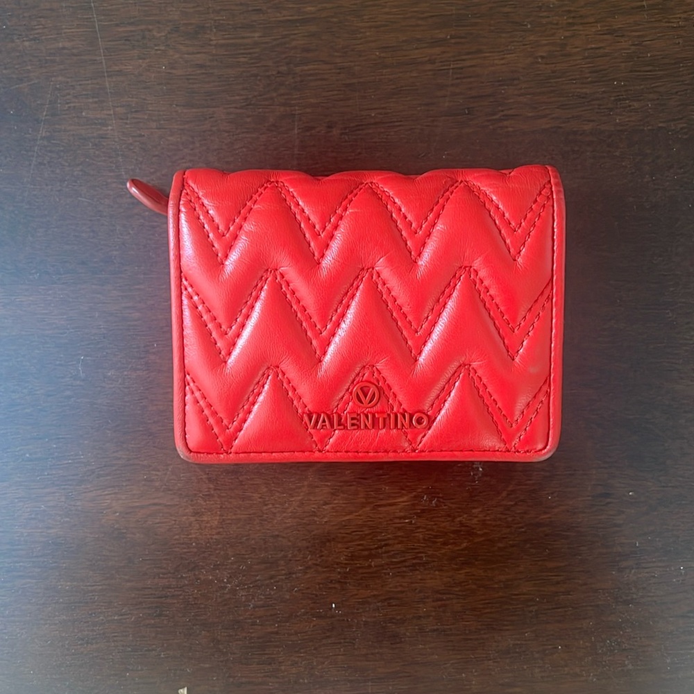 Valentino wallet, good condition. Color is most like the first picture